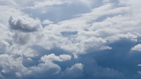 Dark and heavy storm clouds forming on a blue sky time lapse Stock Footage 120867532