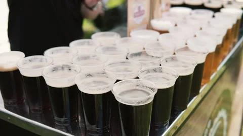 Dark and light beer in a camp in the forest Stock-Footage 134487339