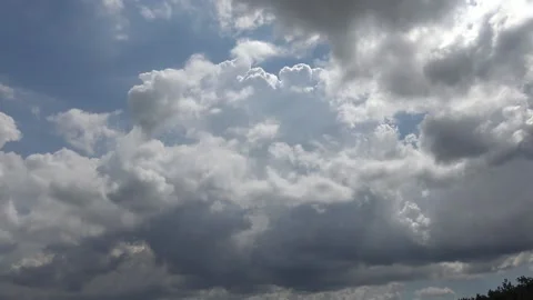 Dark and light clouds filling the sky timelapse Stock Footage 159074638