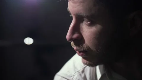 Dark and moody close up of a frustrated. burned out and tired Caucasian man. Vídeos de archivo 147406246