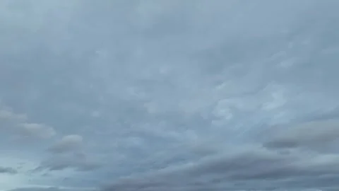 Dark and overcast cloudy sky, perfect for use as a background Stock Footage 312884724