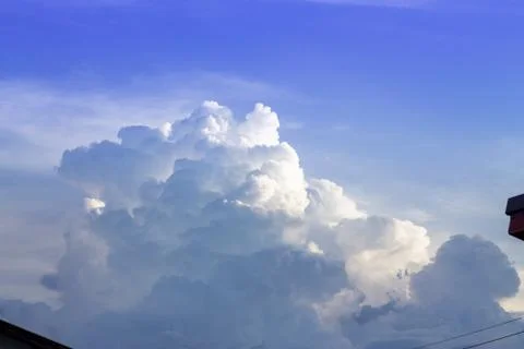 Dark and violent storm clouds in the background Before rain in the rainy seas Stock Photos