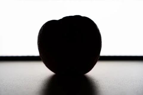 Dark apple isolated on white background. Stock Photos