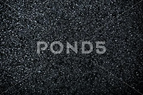 Dark asphalt roadbed. Stock Photos