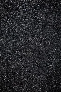 Dark asphalt roadbed. Stock Photos