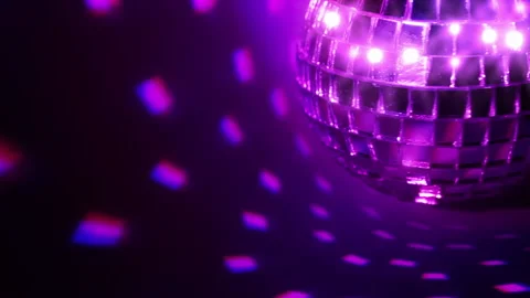 Dark background and disco ball. Seamless loop Видео 106485181