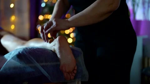 Dark background and subdued light create an intimate atmosphere during  Stock Footage 301309412