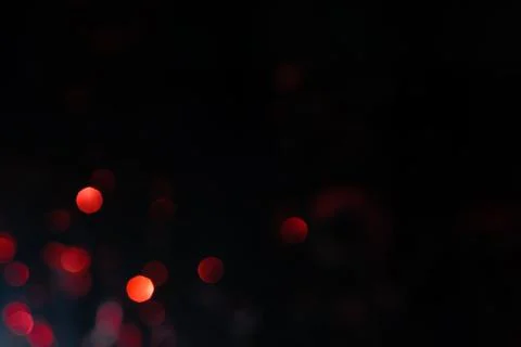 Dark background with bright bokeh. 写真素材