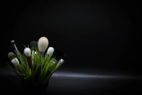 Dark background with brushes Stock Photos