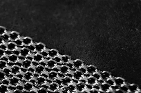 Dark background with a decorative chain in the corner Stock Photos