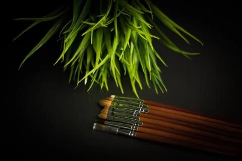 Dark background with different brushes Stock Photos