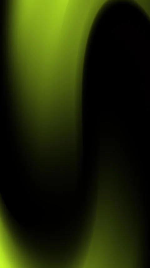 Dark background features soft yellowish green glowing curves. Stock Footage 297578016