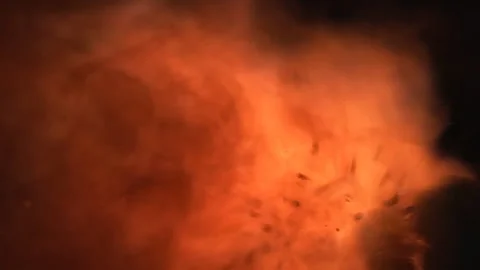 On a dark background fire sparks animation, slow motion Stock Footage 149290666