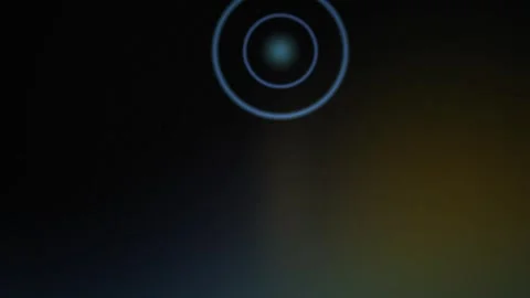 Dark background with glowing blue and yellow circles. Stock Footage 337503306