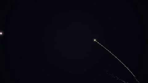 A dark background is illuminated by streaks of light, showcasing rapid moti.. Stock Footage 328885392