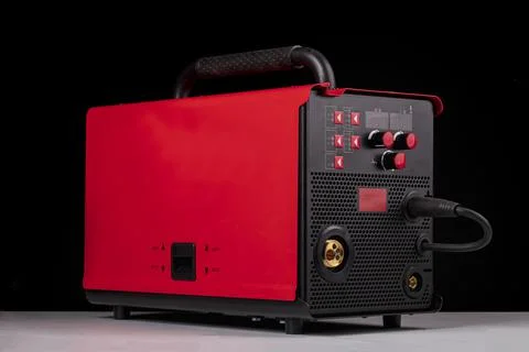 Dark background. it has an assembly for welding metal products. red color. cl Stock Photos