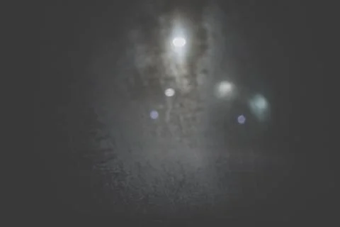 Dark background, light from the lamp on the road Stock Photos