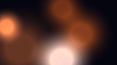 A dark background with multiple light circles Video stock 330075816