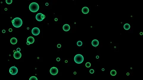 A dark background with numerous varying sizes of bright green circular shap.. Stock Footage 324976966