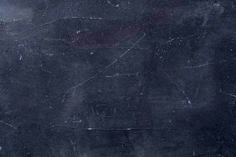 Dark background of old black plaster, grunge texture Stock Photos