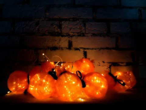 Dark background with orange bulbs Stock Photos