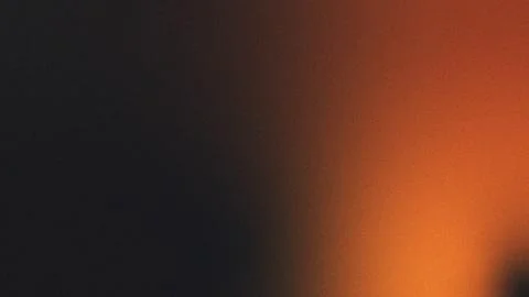 Dark background with orange gradient and subtle grain texture abstract 스톡 일러스트