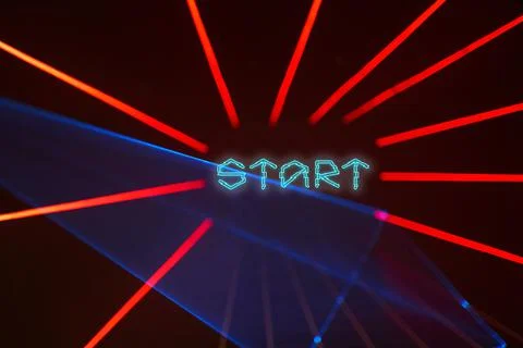 Dark background with red laser beams and text Start. Illustrazione stock