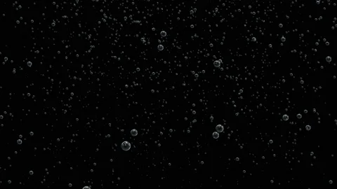 Dark background with small black and white bubbles oil inside a dark liquid for Stock Footage 113669334
