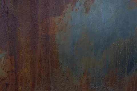 Dark background , texture. Copper wall with blue oxidation and rust strips. Stock Photos