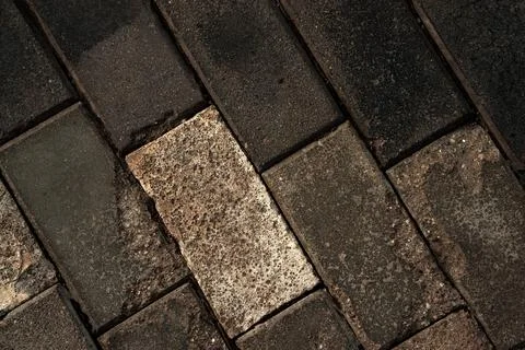 Dark background top view sidewalk old stone pavement 写真素材