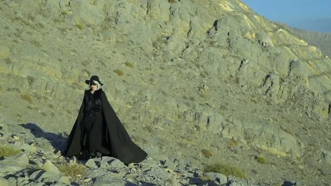 Dark beautiful lady in the mountains Stock-Footage 72532165