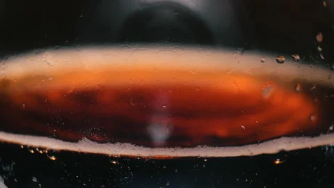 Dark beer close-up. A pint of cold craft beer. Glass of beer with drops of water Stock Footage 131103496