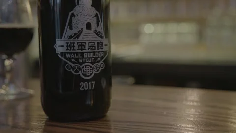 Dark Beverage Bottle on Bar Counter in Beijing Drink Scene, Close-Up Interior Stock Footage 345756776