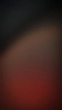 Dark black and brown with deep red vertical abstract grainy gradient wallpa.. Stock Photos