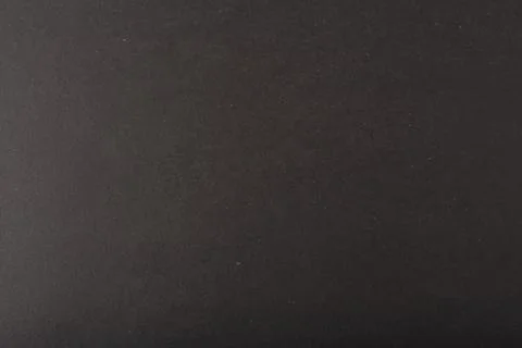 Dark black background with copy space. Top view of rough black board Stock Photos