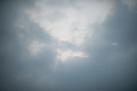 Dark black clouds in sky, Stormy rain clouds background. Stock Photos