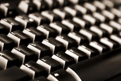 Dark black computer keyboard can be used as background 写真素材
