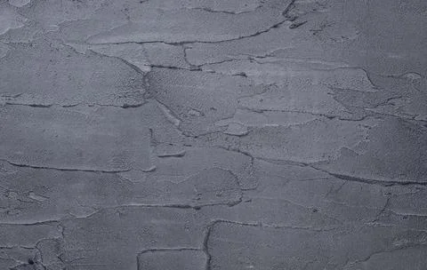Dark black concrete wall texture background. Natural black slate concrete b.. Stock Photos
