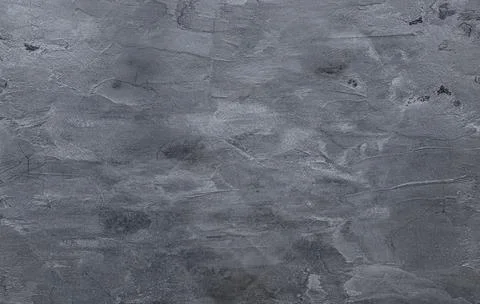 Dark black concrete wall texture background. Natural black slate concrete b.. Stock Photos