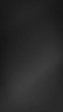 Dark black gradient grainy vertical background texture for tech abstract wa.. Stock Photos