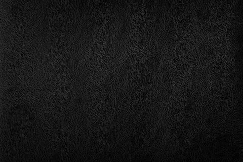Dark black leather sofa surface texture background Stock Photos