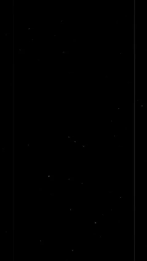 Dark black screen texture with flickering dust particles and noise. Retro f.. Stock Footage 344889867