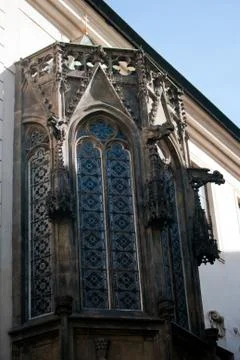 Dark black wall of a gothic cathedral in Prague, Czech Republic. Stock Photos