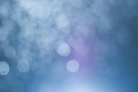 Dark blue abstract background with bokeh. Colorful twinkling lights bokeh lig Stock Photos