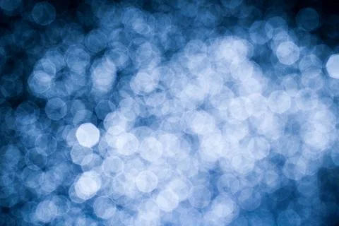Dark blue abstract background with bokeh. Colorful twinkling lights bokeh lig Stock Photos