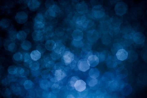 Dark blue abstract background with bokeh. Colorful twinkling lights bokeh lig Stock Photos