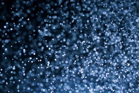 Dark blue abstract background with bokeh. Colorful twinkling lights bokeh lig Stock Photos