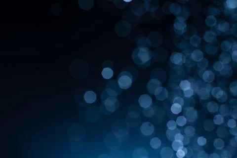 Dark blue abstract background with bokeh. Colorful twinkling lights bokeh lig Stock Photos