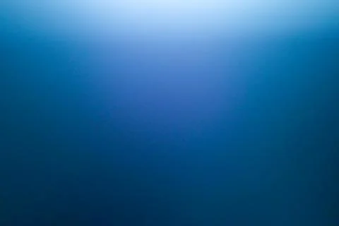 Dark blue abstract background with bokeh. Colorful twinkling lights bokeh lig Stock Photos