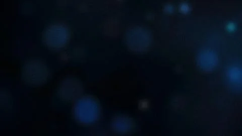 Dark blue abstract gradient with soft bokeh lights and a subtle grainy text.. Stock Photos